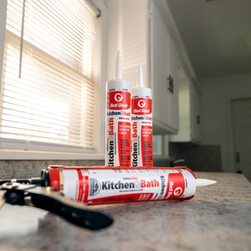 Red Devil 040520 Silicone Acrylic Caulk & Sealant, 100% Waterproof, Paintable, Off-White Caulking for Kitchen, Bathroom, Window, With Duraguard, 5.5 oz, Biscuit, Made in USA - Image 4